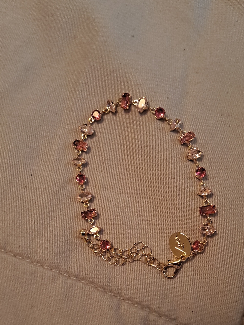 Gold-Tone Bracelet with Pink Gem Accents